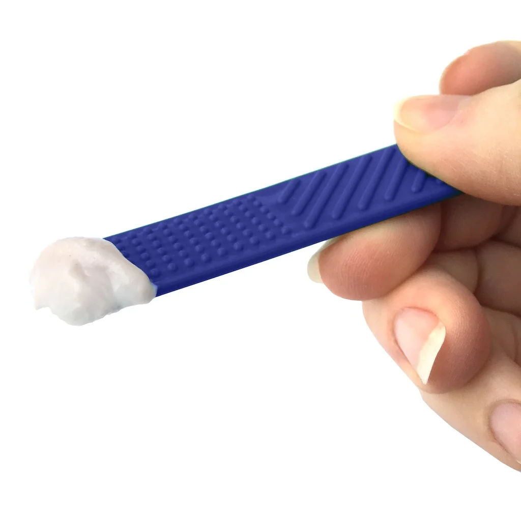 ARK cucchiaio piatto testurizzato lato scanalato dettaglio piccole quantita di cibo supporto sensoriale nel passaggio ai cibi solidi